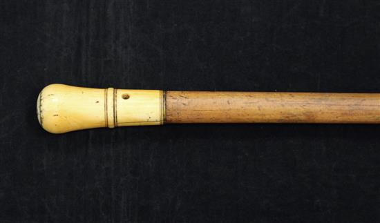 An English ivory and pique work handled walking cane, late 17th century, 98.5cm (38.75in.)